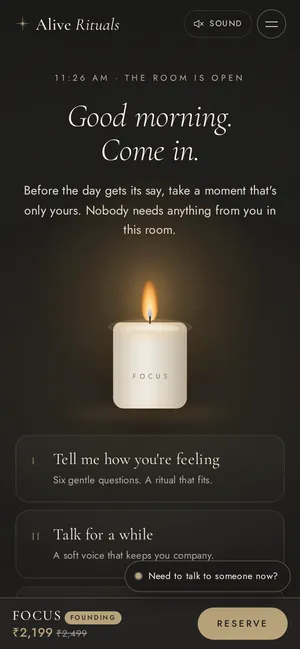 Alive Rituals homepage on a phone, with the candle, ritual cards and a reserve bar at the bottom